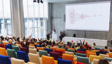 Un auditoire lors d'une conférence